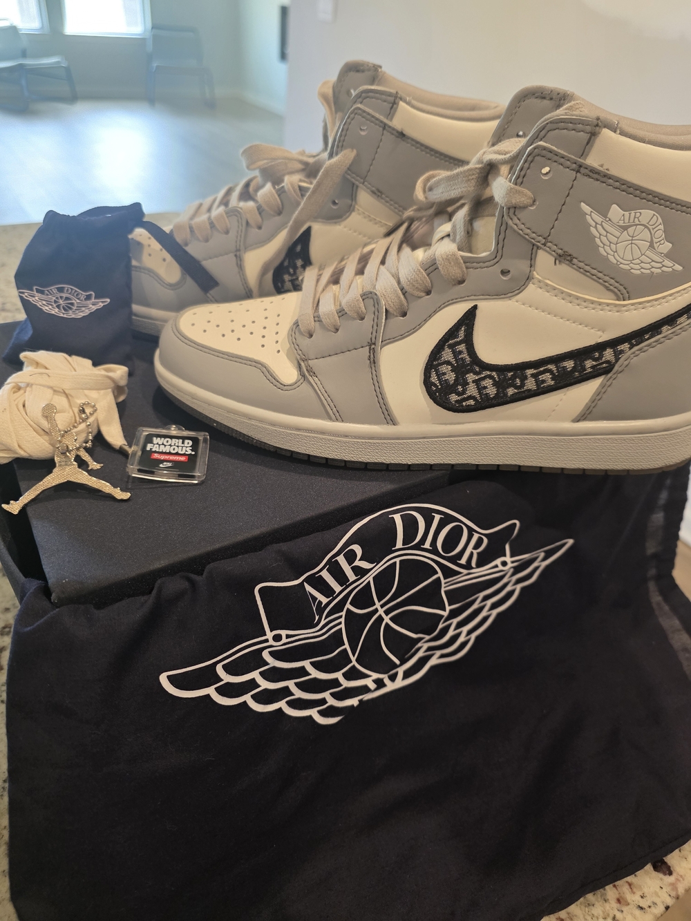 Dior High-Top Sneakers in Cream and Light Gray with Dior Monogram Swoosh